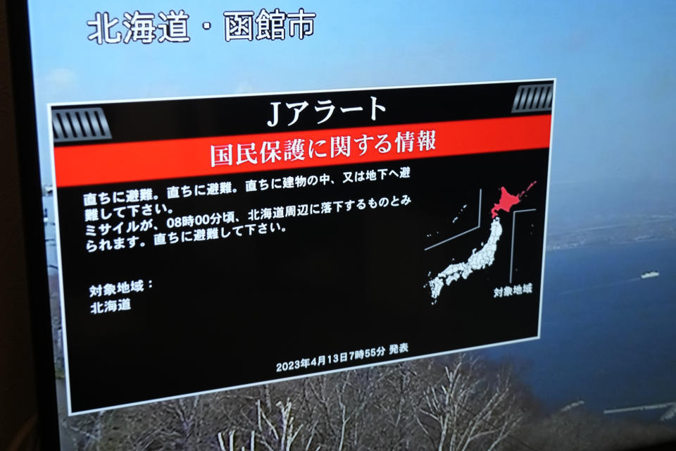 A TV shows J-Alert or National Early Warning System to the Japanese residents Thursday, April 13, 2023, in Yokohama, south of Tokyo. North Korea launched a ballistic missile toward the sea between the Korean Peninsula and Japan on Thursday, prompting Japan to order residents on the island of Hokkaido to take shelter as a precaution. The government then corrected and retracted its missile alert saying its analysis showed there was no possibility of a missile landing near Hokkaido. (AP Photo/Shuji Kajiyama)