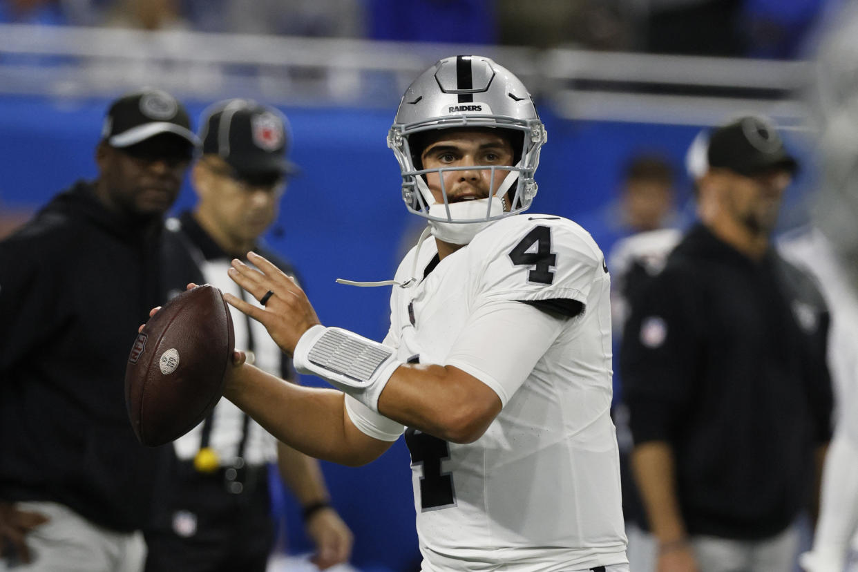 Las Vegas Raiders quarterback Aidan O'Connell throws during pregame of an NFL football game against the Detroit Lions, Monday, Oct. 30, 2023, in Detroit. (AP Photo/Duane Burleson)