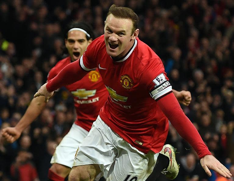 Manchester United's Wayne Rooney celebrates scoring a penalty during their English Premier League match against Sunderland at Old Trafford in Manchester, north-west England, on February 28, 2015