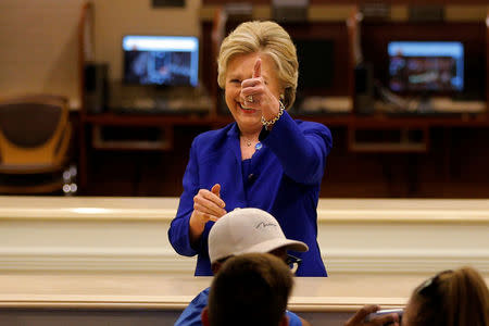 U.S. Democratic presidential nominee Hillary Clinton arrives to greet hotel workers at The Mirage in Las Vegas, Nevada, U.S. November 2, 2016. REUTERS/Brian Snyder