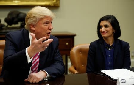 FILE PHOTO - U.S. President Donald Trump attends the Women in Healthcare panel hosted by Seema Verma (R), Administrator of the Centers for Medicare and Medicaid Services, at the White House in Washington, U.S., March 22, 2017. REUTERS/Kevin Lamarque