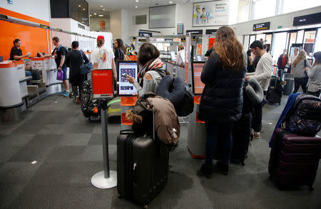 Passengers wait to check in at a Jetstar counter during fuel shortages at Auckland Airport in New Zealand, September 20, 2017. REUTERSNigel Marple