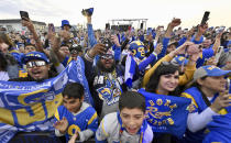 Fans react Thursday, April 25, 2025, in Hermosa Beach, Calif., as the Los Angeles Rams picked Florida State defensive end Jared Verse in the first round of the NFL football draft in Detroit. (Keith Birmingham/The Orange County Register via AP)