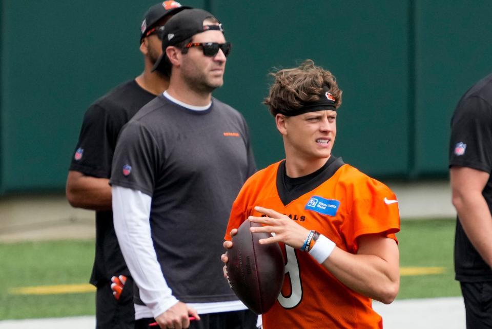 Cincinnati Bengals quarterback Joe Burrow (9) looks to throw a pass during an off-season workout inside Paycor Stadium in downtown Cincinnati on Tuesday, June 13, 2023.