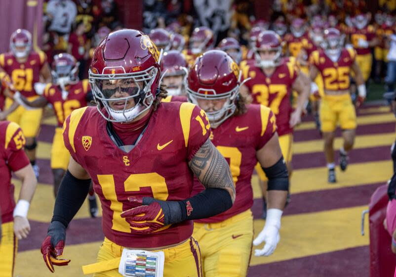 LOS ANGELES, CA - OCTOBER 21, 2023: USC Trojans Mason Cobb (13) enters the stadium.