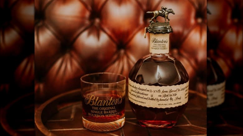Blanton's bourbon bottle on table