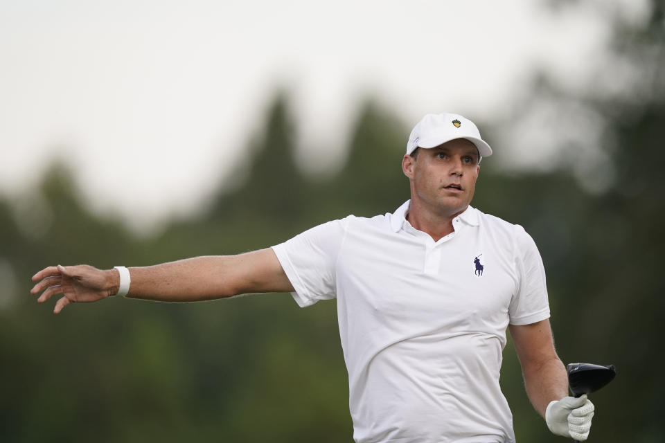 Nick Watney tries to direct his drive from the 18th tee box during the second round of the Sanderson Farms Championship golf tournament in Jackson, Miss., Friday, Oct. 1, 2021. Watney finished the day in a three-way tie for first at 13-under. (AP Photo/Rogelio V. Solis)