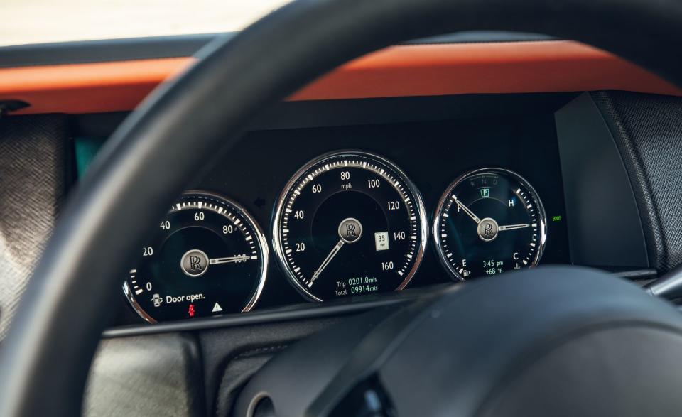 <p>Rolls-Royce doesn't fit a tachometer to the Cullinan, but there is a power-reserve gauge that lets you know how many of the 563 horsepower you're not using.</p>