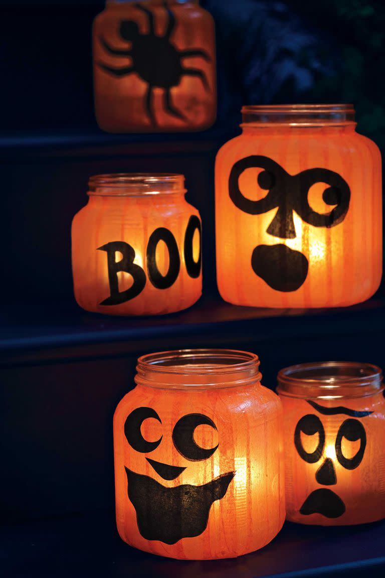 <p>Start saving a few glass jars from the recycling bin to craft these cute luminaries. Thanks to some tissue paper and decoupage glue, little "pumpkins" can light the way along your front walk or up the porch steps. </p><p><a class="link " href="https://www.amazon.com/Tissue-Paper-Orange-Sheets-PMLAND/dp/B07CNBDT2F/?th=1&tag=syn-yahoo-20&ascsubtag=%5Bartid%7C10055.g.1566%5Bsrc%7Cyahoo-us" rel="nofollow noopener" target="_blank" data-ylk="slk:SHOP TISSUE PAPER;elm:context_link;itc:0;sec:content-canvas">SHOP TISSUE PAPER</a> </p><p><em><a href="https://www.womansday.com/home/crafts-projects/how-to/a5994/halloween-craft-how-to-pumpkin-jar-lights-124116/" rel="nofollow noopener" target="_blank" data-ylk="slk:Get the tutorial at Woman's Day »;elm:context_link;itc:0;sec:content-canvas" class="link ">Get the tutorial at Woman's Day »</a></em></p>