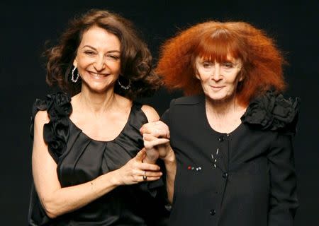 French designer Sonia Rykiel (R) who appeared with her daughter Nathalie Rykiel, artistic director for the fashion house Rykiel, at the end of their Autumn/Winter 2007-2008 ready-to-wear fashion show in Paris, France March 2, 2007. French designer Sonia Rykiel, known for her brightly coloured striped outfits, has died at the age of 86, the parent company of the fashion label she founded said August 25, 2016. REUTERS/Charles Platiau/File Photo
