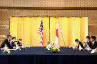 U.S. Deputy Secretary of State Stephen Biegun, left, the top U.S. official on North Korea, speaks as Japan's Defense Minister Taro Kono, right, listens during a bilateral meeting in Tokyo Friday, July 10, 2020. (Behrouz Mehri/Pool Photo via AP)