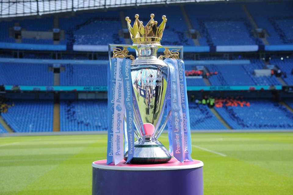 FILE - In this Sunday, May 6, 2018 file photo, the English Premier League trophy is displayed on the pitch prior to the English Premier League soccer match between Manchester City and Huddersfield Town at Etihad stadium in Manchester, England. Steve Parish, the chairman of Crystal Palace, says the Premier League could face years of legal challenges if this season is not completed due to the coronavirus pandemic. (AP Photo/Rui Vieira, File)