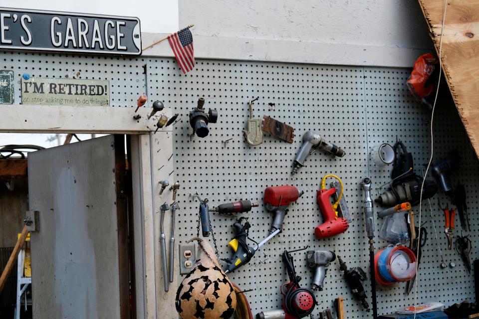 Tools are seen still hanging on a wall of a garage at the home of Noble residents Bill, 79, and Linda, 72, Edmondson.