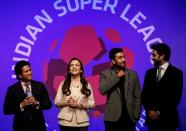 FILE PHOTO: Bollywood actors and co-owners of football clubs Bachhan and Kapoor react as retired cricketer and co-owner of the Kerala Blasters Sachin Tendulkar speaks during the emblem-unveiling ceremony of Indian Super League in Mumbai