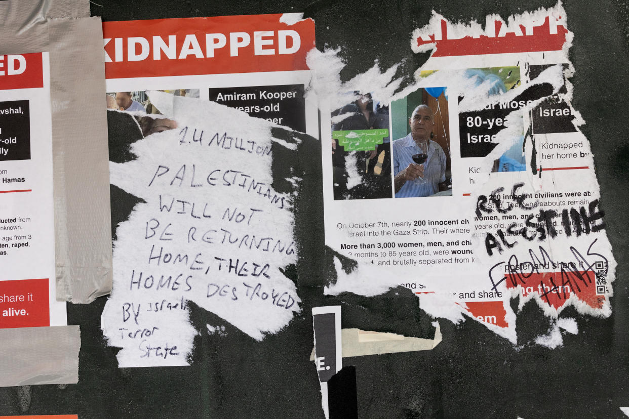 Posters on the campus of New York University show images of people kidnapped by Hamas have been vandalized and covered with pro-Palestinian graffiti