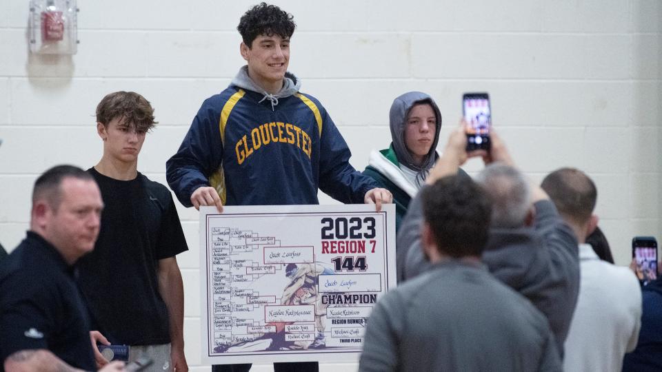 Gloucester City's Jacob Zearfoss stands at the top of the podium after defeating Southern's Hayden Hochstrasser, 4-3, in the 144 lb. championship bout of the  Region 7 wrestling tournament at Cherry Hill East High School on Saturday, February 25, 2023.