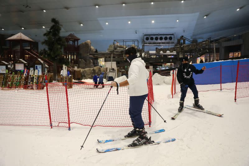 People get ready to ski at Ski Dubai during the reopening of malls, following the outbreak of the coronavirus disease (COVID-19), at Mall of the Emirates in Dubai