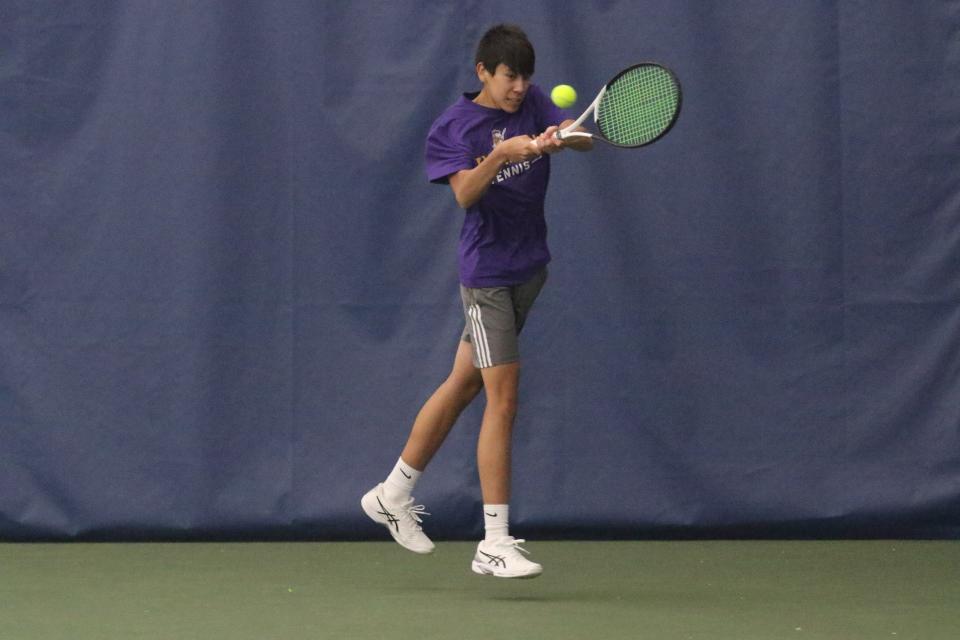 Lexington's Ethan Remy returns a serve during the Lexington Tennis Invite on Saturday afternoon.