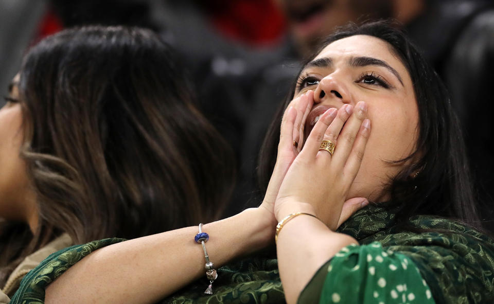 Pakistan fans, pictured here looking on in disbelief during their loss to Zimbabwe at the T20 World Cup.