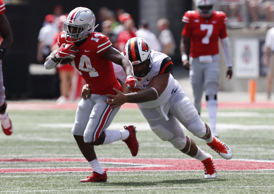 Ohio State paid Oregon State a lot of money to play in Week 1. (AP Photo/Jay LaPrete)