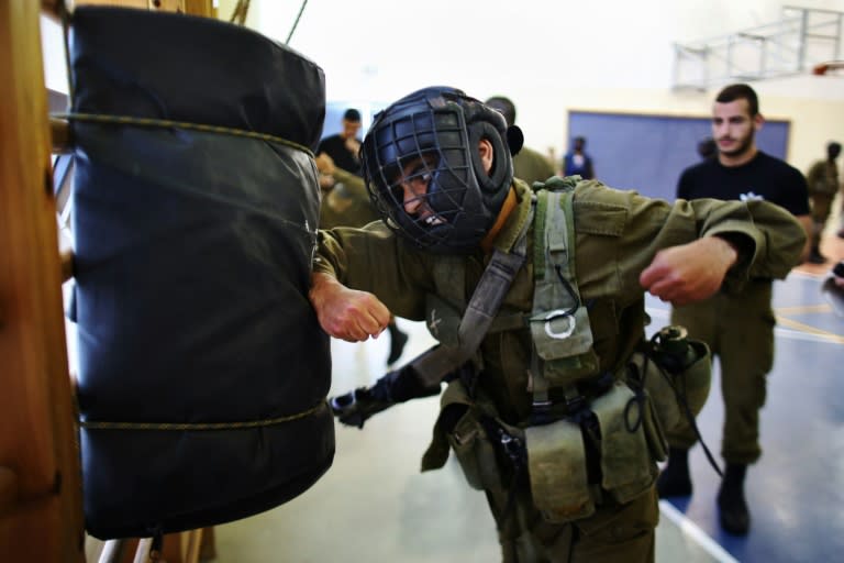 Israeli Golani soldiers take part in a Krav Maga training session at the Regavim Army base in northern Israel, on April 19, 2016