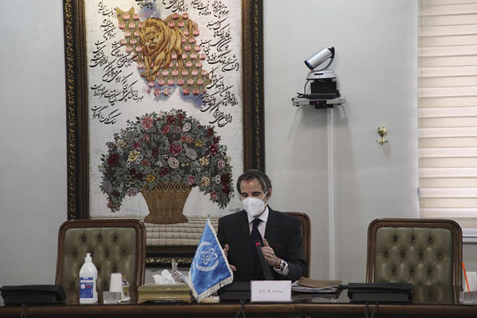 Director General of International Atomic Energy Agency, IAEA, Rafael Mariano Grossi speaks in a meeting with Iran's atomic chief Ali Akbar Salehi in Tehran, Iran, Sunday, Feb. 21, 2021. Grossi met with Salehi ahead of Iran's plans to partly suspend United Nations inspections of the country's nuclear facilities. (Atomic Energy Organization of Iran via AP)