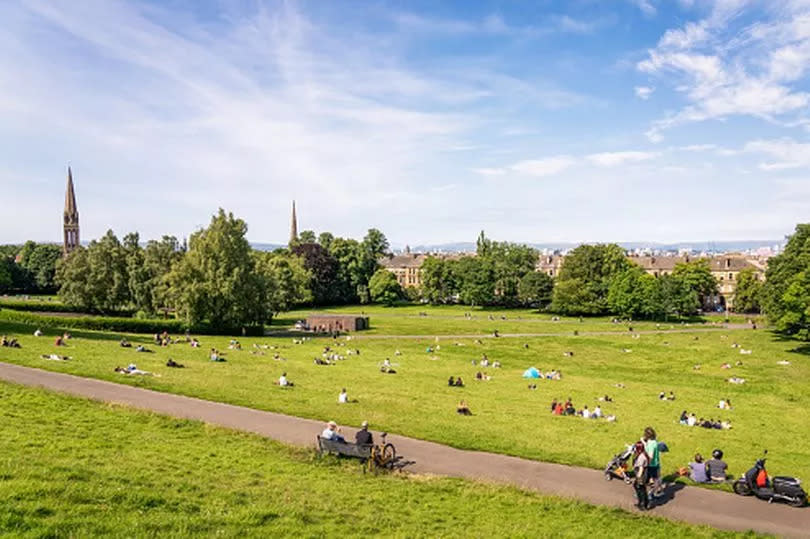 People making the most of the sun in Queen's Park, Glasgow