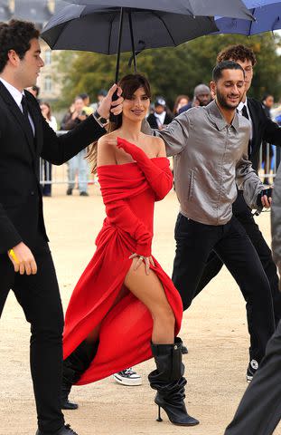 <p>Jacopo Raule/Getty Images</p> Emily Ratajkowski attends the Loewe Spring/Summer 2024 show