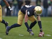 Cam McDaniel #33 of the Notre Dame Fighting Irish has trouble handling a kick-off against the Pittsburgh Panthers at Notre Dame Stadium on November 3, 2012 in South Bend, Indiana. (Photo by Jonathan Daniel/Getty Images)