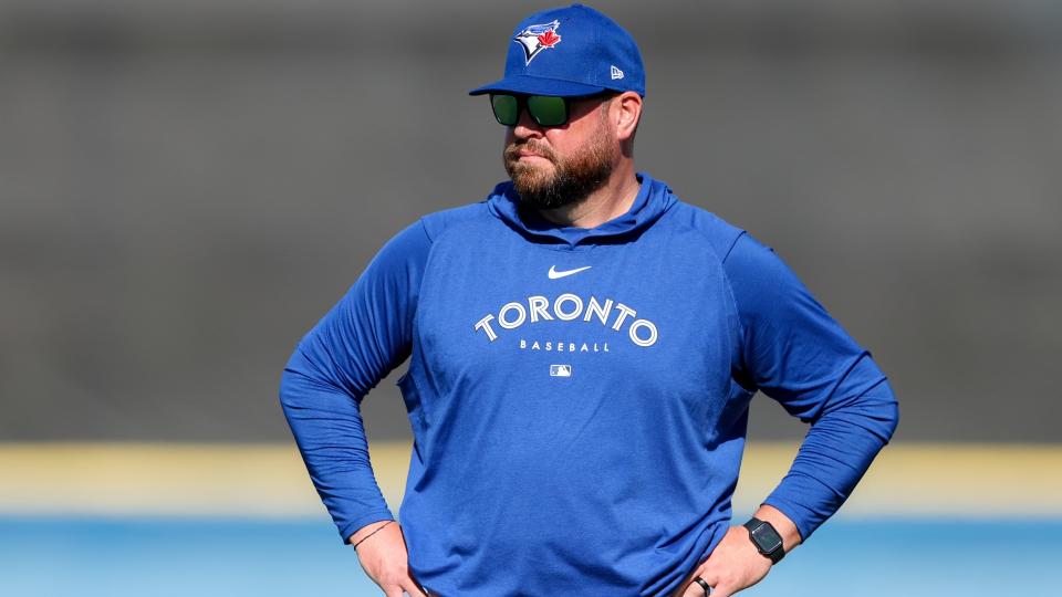 Blue Jays manager John Schneider was quick to react when he noticed a woman choking on her food while having lunch in Florida. (Reuters)