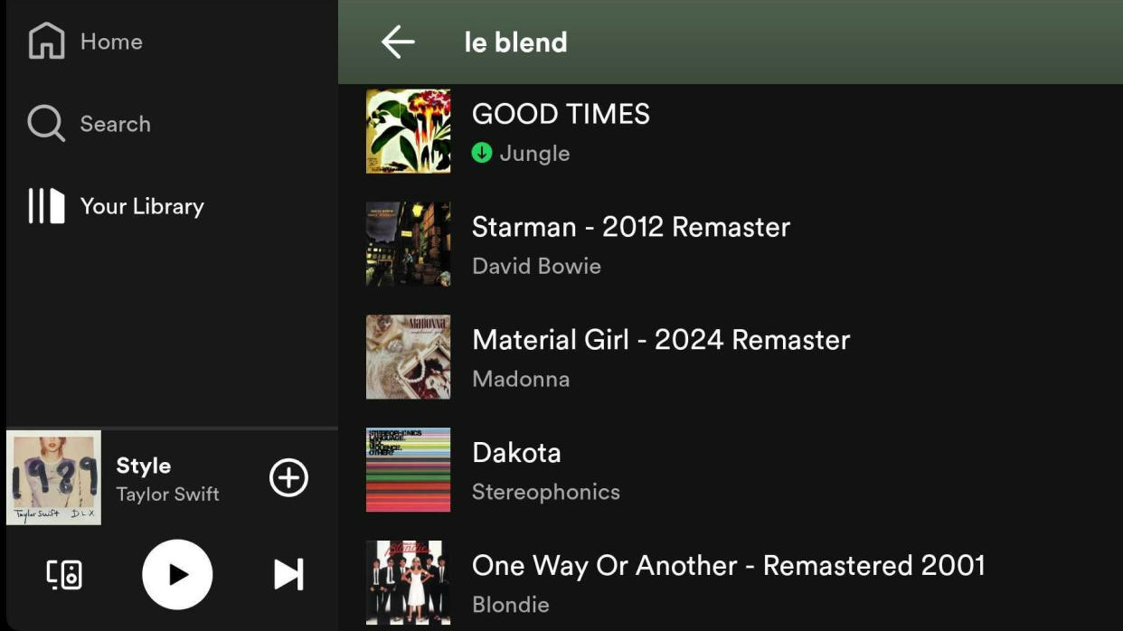 Screenshot of the Spotify Blend playlist with a selection of songs and artists. 