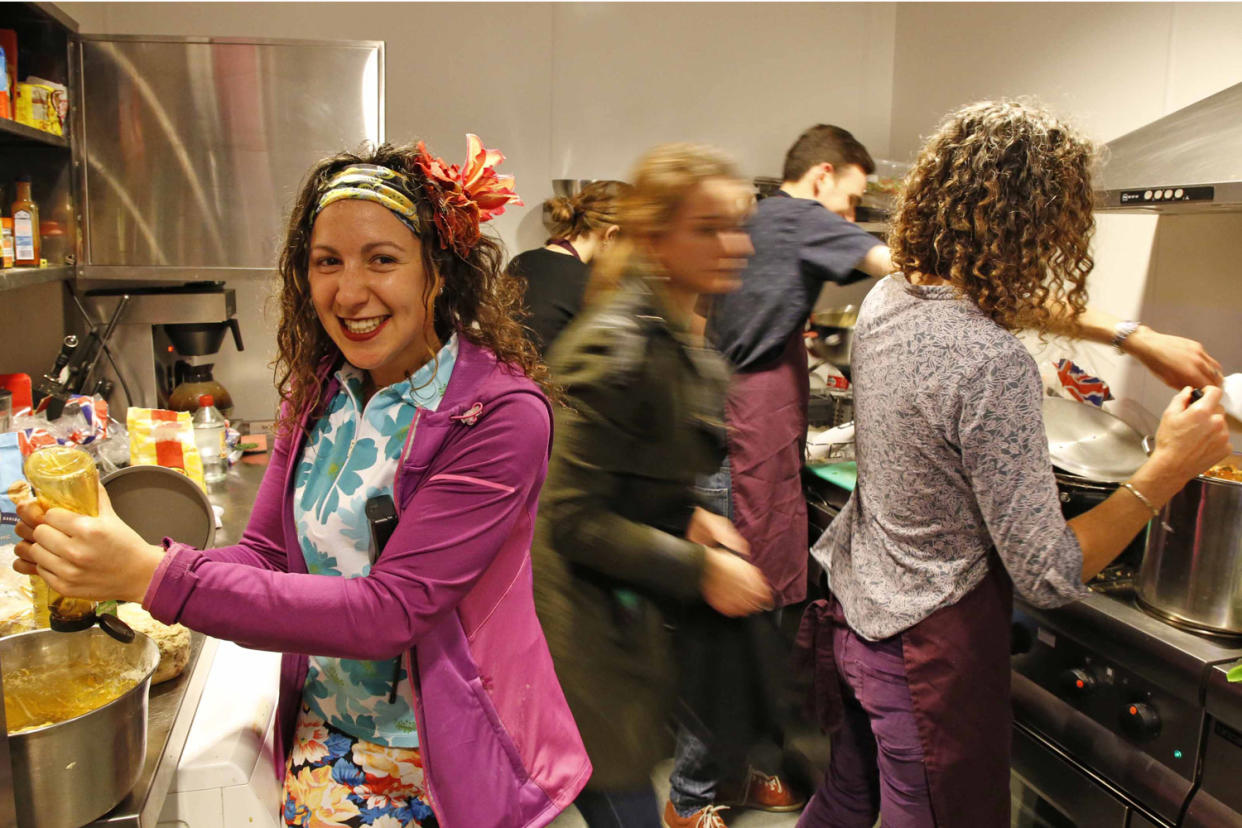 Hannah Style and fellow volunteers serve food to residents at Conway House: Nigel Howard