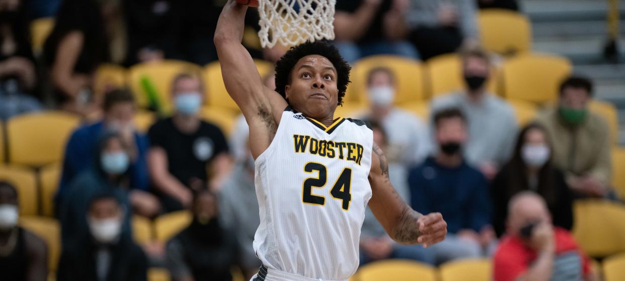The College of Wooster's Najee Hardaway goes up for a dunk.