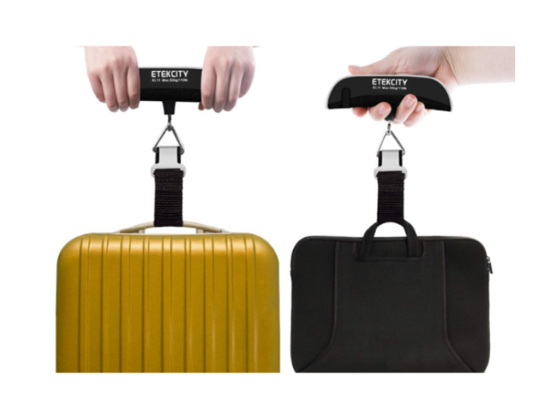 Two luggage weights holding two suitcases