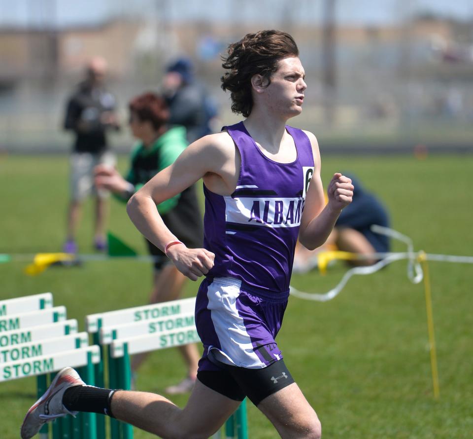 Albany's Grant Mayers keeps a pace during the 1600-meter run at the Mega Meet on Saturday, May 7, 2022, at Sauk Rapids-Rice Middle School. 