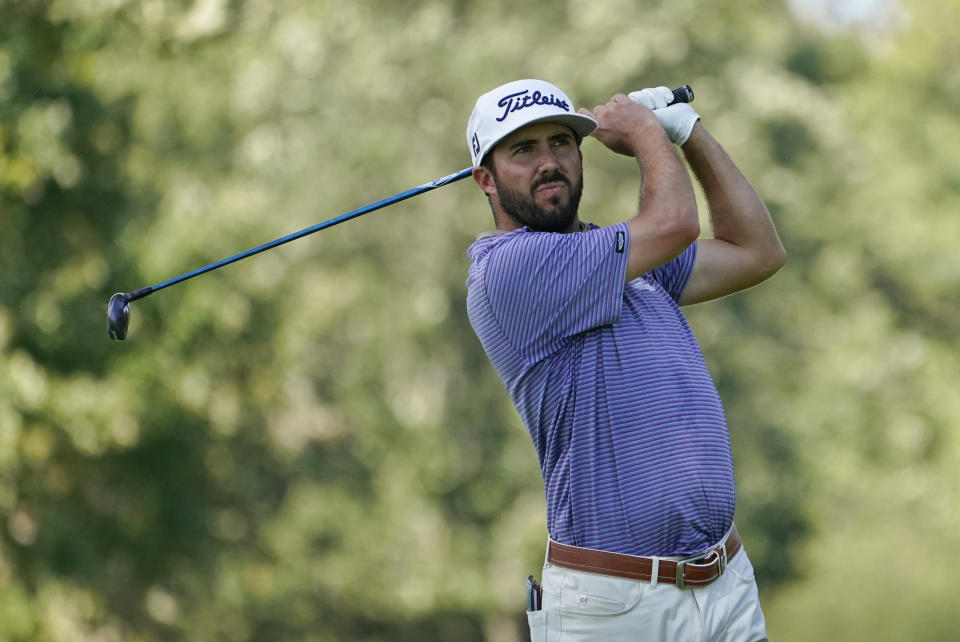 Mark Hubbard hits from the 12th tee during the first round of the BMW Championship golf tournament, Thursday, Aug. 27, 2020, at Olympia Fields Country Club in Olympia Fields, Ill. (AP Photo/Charles Rex Arbogast)