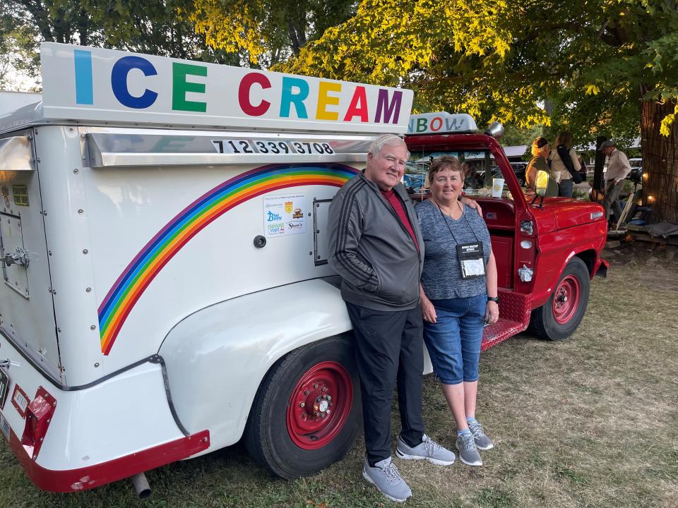 Bob and Kate Shaw of Spirit Lake take a rest beside their 1967 Ford F-250 that has supported them with ice cream sales since 1985. Here they're at Iowa Lakeside Laboratory during the annual Okoboji Writers Retreat.