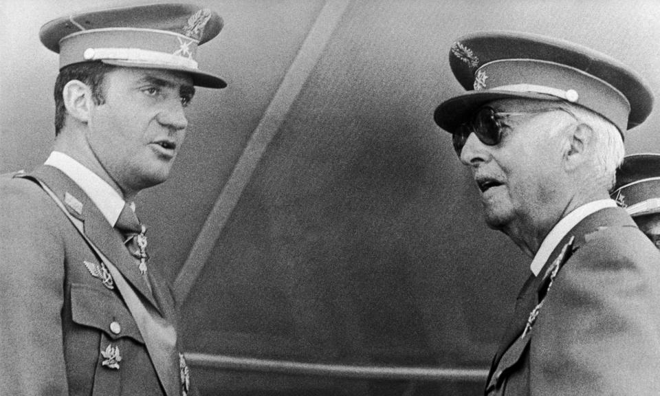 General Francisco Franco with his heir apparent Prince (later King) Juan Carlos at a military ceremony in Madrid in 1972. (Photo by: Universal History Archive/Universal Images Group via Getty Images)