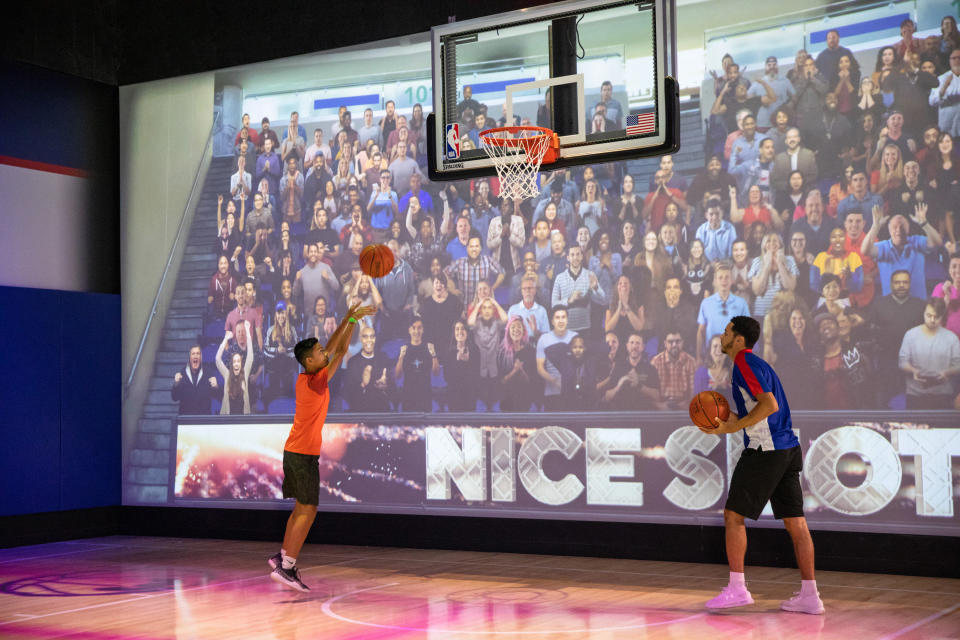 NBA fans test their skills at NBA Experience at Walt Disney World Resort in Lake Buena Vista, Fla. (Photo: Steven Diaz) 