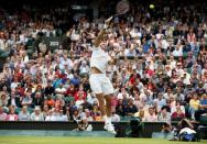 Britain Tennis - Wimbledon - All England Lawn Tennis & Croquet Club, Wimbledon, England - 1/7/16 Argentina's Juan Martin Del Potro in action against Switzerland's Stan Wawrinka REUTERS/Paul Childs