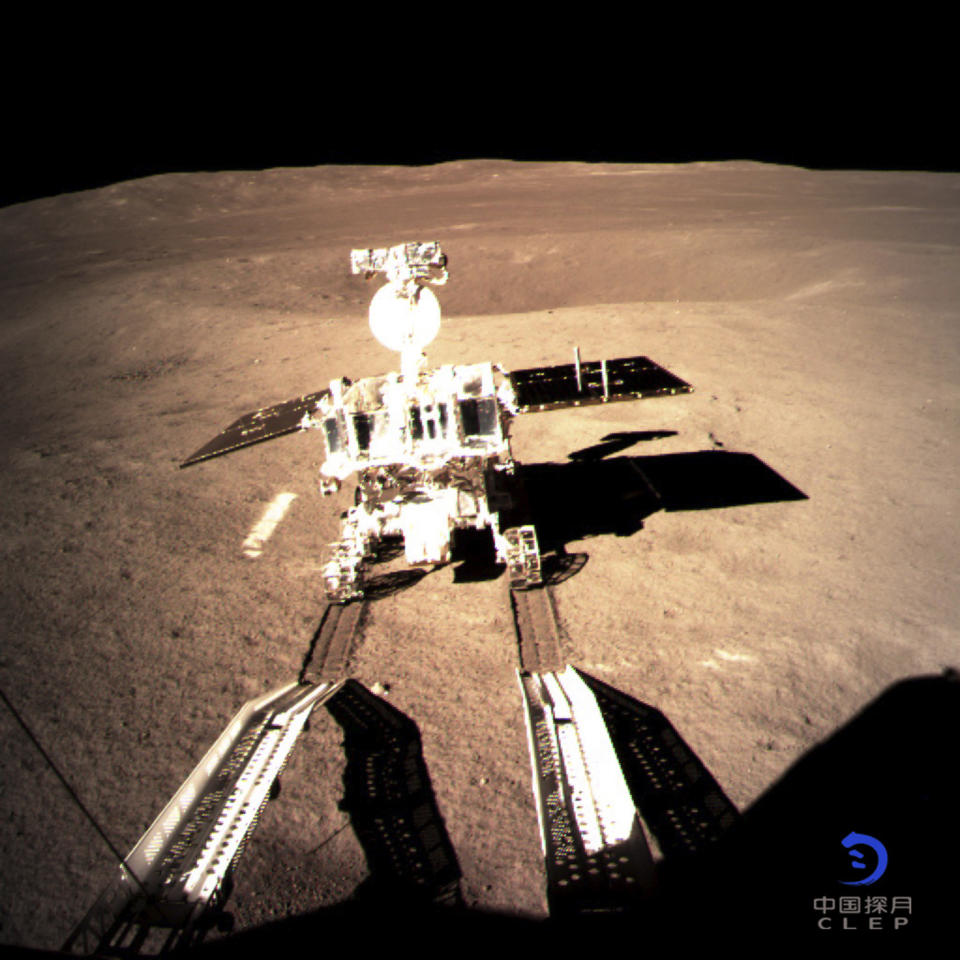 In this photo provided on Thursday, Jan. 3, 2019, by China National Space Administration via Xinhua News Agency, Yutu-2, China's lunar rover, leaves wheel marks after leaving the lander that touched down on the surface of the far side of the moon. A Chinese spacecraft on Thursday, Jan. 3, made the first-ever landing on the far side of the moon, state media said. The lunar explorer Chang'e 4 touched down at 10:26 a.m., China Central Television said in a brief announcement at the top of its noon news broadcast. (China National Space Administration/Xinhua News Agency via AP)