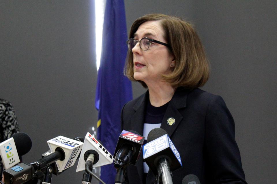 Gov. Kate Brown speaks at a news conference to announce a four-week ban on eat-in dining at bars and restaurants throughout the state Monday, March 16, 2020, in Portland.