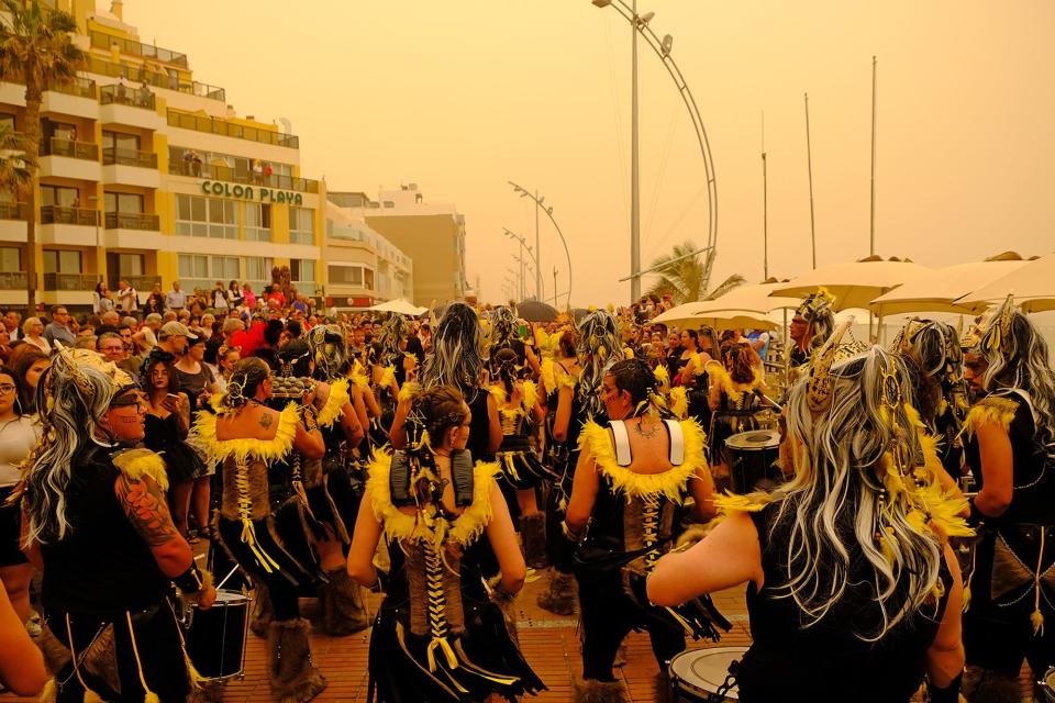 Parades of 'Carnaval al Sol' at Las Canteras Beach during a sandstorm on February 22, 2020 in Las Palmas De Gran Canaria, Spain.