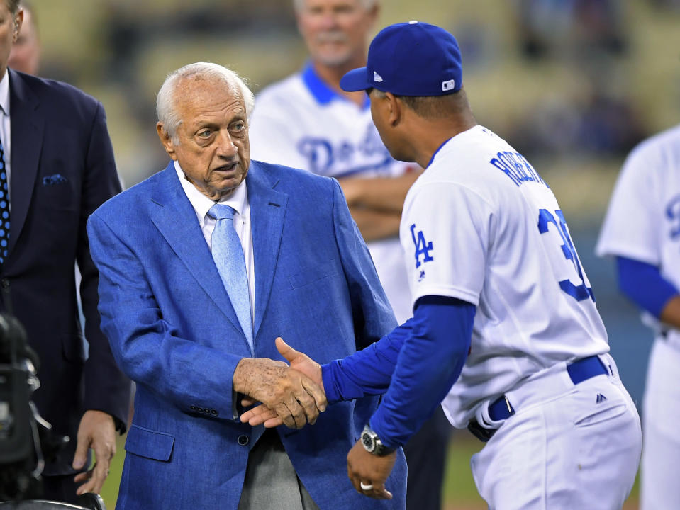 Tommy Lasorda let Dave Roberts know what he had to do on the eve of Game 7. (AP Photo/Mark J. Terrill)
