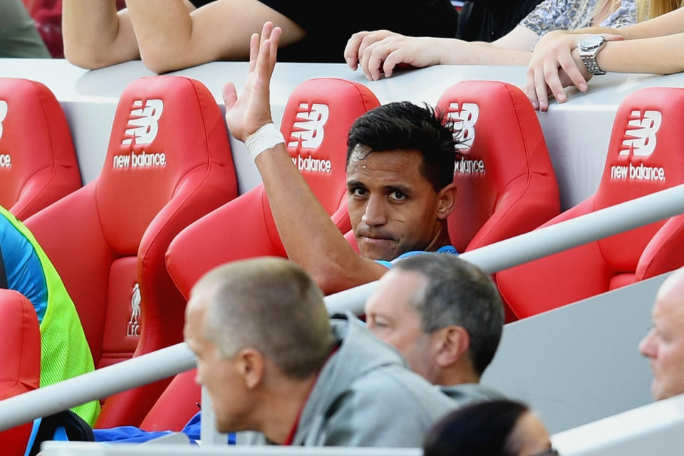 Alexis Sanchez appeared to wave goodbye to Arsenal from the Liverpool bench – but he’s not been sold