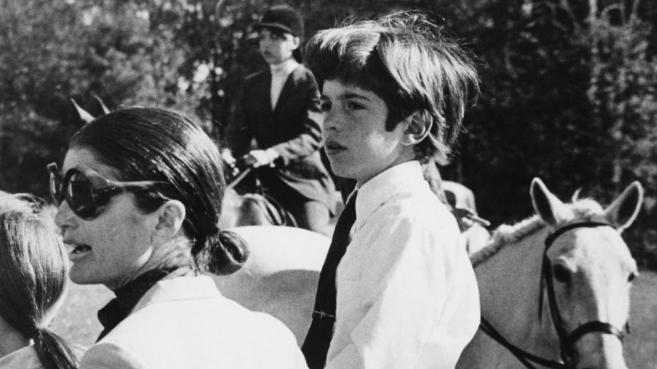 Mrs. Jacqueline Onassis and her son, John F. Kennedy, Jr. Getty.