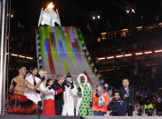 <p>Athletes from various nations including Pita Taufatofua, of Tonga, at left, United States’ Lindsey Vonn, third from left, and Thomas Bach, president of the International Olympic Committee, fifth from left, pose during the closing ceremony of the 2018 Winter Olympics in Pyeongchang, South Korea, Sunday, Feb. 25, 2018. (AP Photo/Kirsty Wigglesworth) </p>