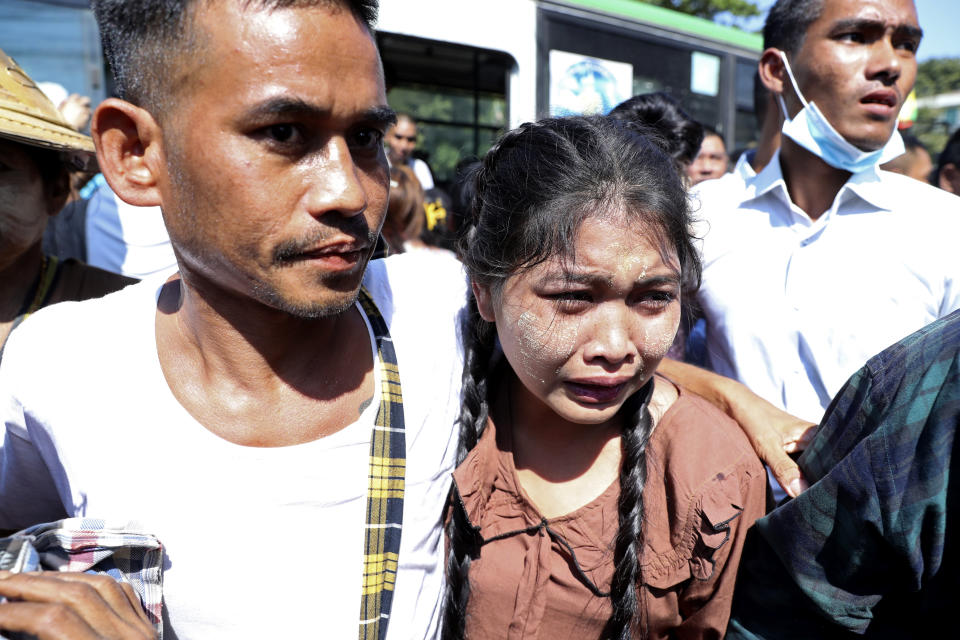 A prisoner, left, is welcomed by family members and colleagues after he was released Insein Prison in Yangon, Myanmar, Thursday, Jan. 4, 2024. Myanmar’s military government on Thursday pardoned nearly 10,000 prisoners to mark the 76th anniversary of gaining independence from Britain, but it wasn’t immediately clear if any of those released included the thousands of political detainees jailed for opposing army rule. (AP Photo/Thein Zaw)