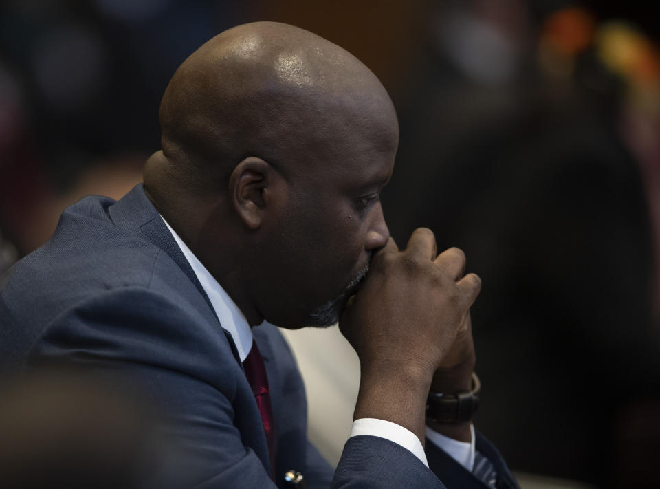 Gambia's Justice Minister Aboubacarr Tambadou waits to address judges of the International Court of Justice during the first day of three days of hearings in The Hague, Netherlands, Tuesday, Dec. 10, 2019. Myanmar's leader Aung San Suu Kyi will represent Myanmar in a case filed by Gambia at the ICJ, the United Nations' highest court, accusing Myanmar of genocide in its campaign against the Rohingya Muslim minority. (AP Photo/Peter Dejong)