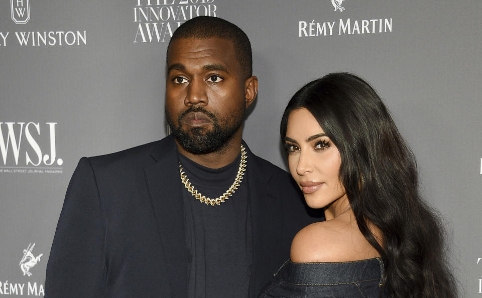 FILE - Kanye West, left, and Kim Kardashian attend the WSJ. Magazine Innovator Awards on Nov. 6, 2019, in New York. Kim Kardashian West filed for divorce Friday, Feb. 19, 2021, from Kanye West after 6 1/2 years of marriage. Sources familiar with the filing but not authorized to speak publicly confirmed that Kardashian filed for divorce in Los Angeles Superior Court. The filing was not immediately available. (Photo by Evan Agostini/Invision/AP, File)